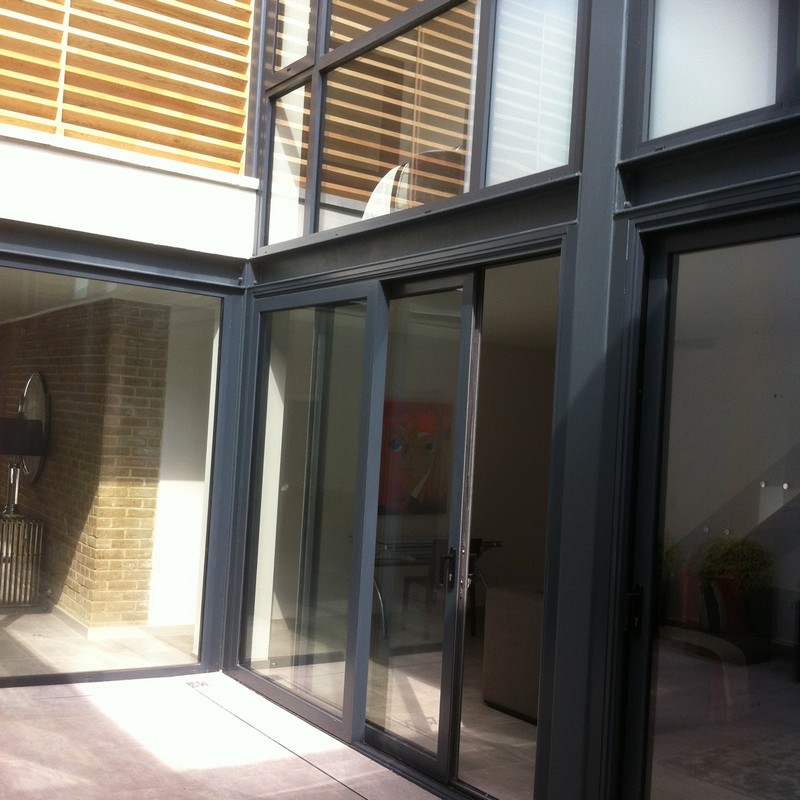 Anthracite aluminium sliding patio doors fitted in Surbiton