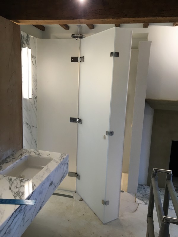 Bespoke frosted glass shower enclosure in Surbiton luxury bathroom