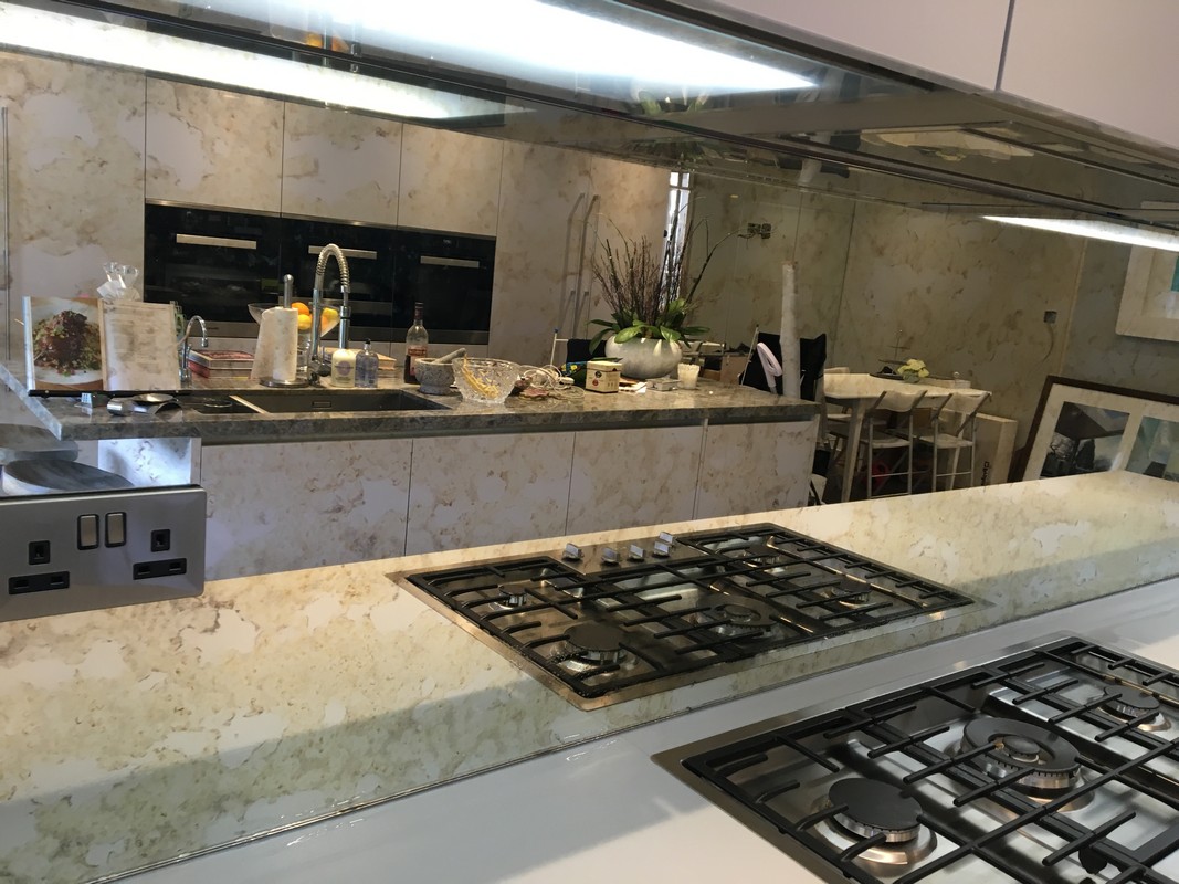 Mirror glass splashback in Surbiton luxury kitchen