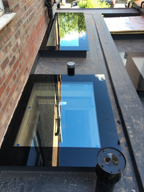 Multiple flat roof skylights on extension in Surbiton